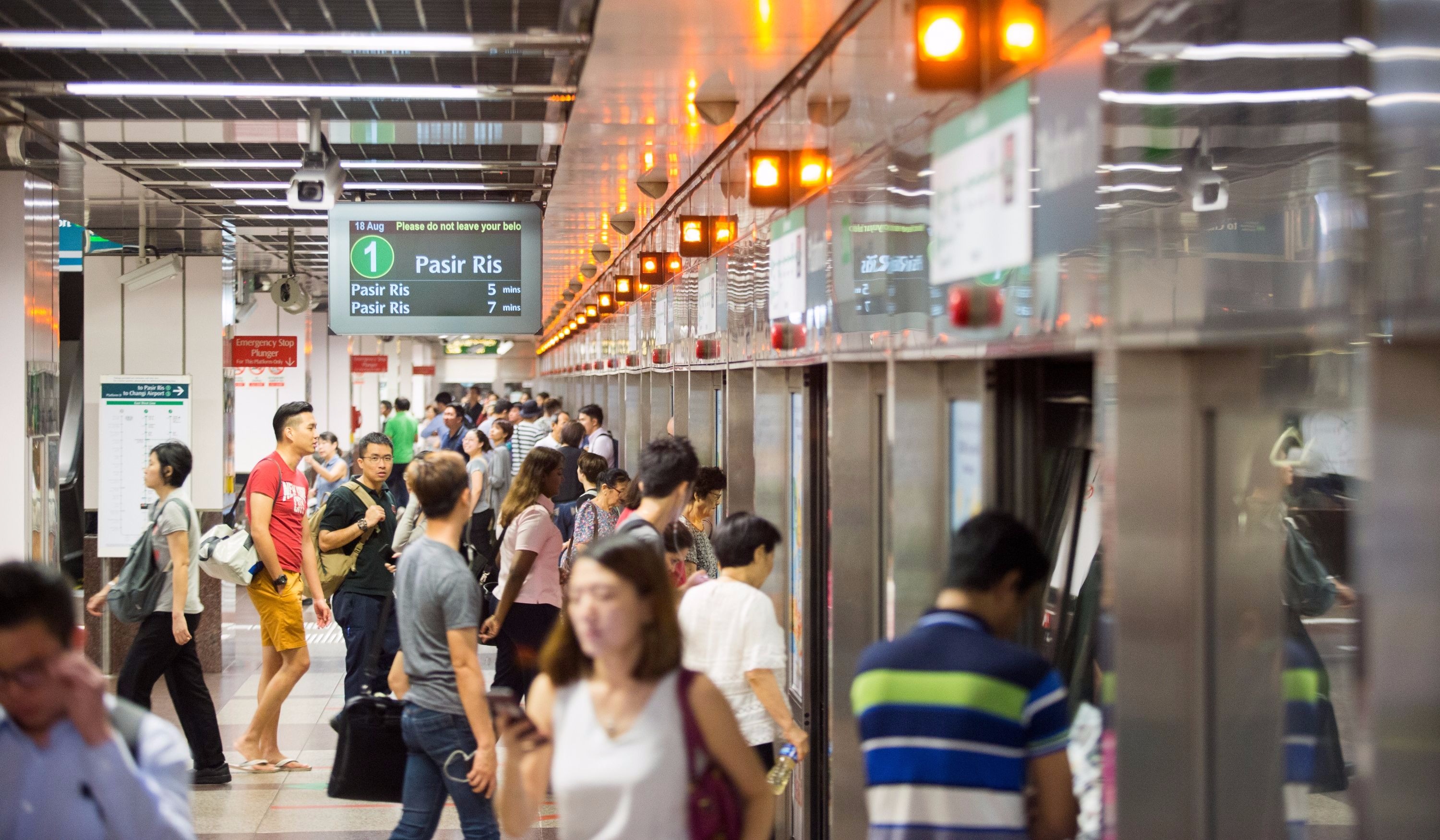 Picture of commuters at MRT station